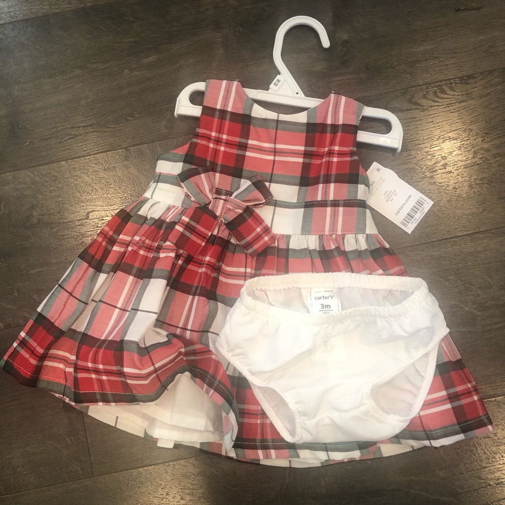 Baby girls dress by Carter’s